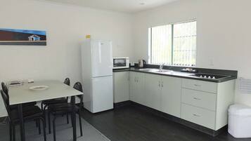 Apartment, 1 Bedroom | Private kitchen | Microwave, coffee/tea maker, electric kettle