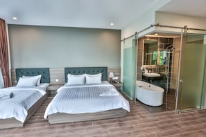 Family Suite | Premium bedding, minibar, in-room safe, desk
