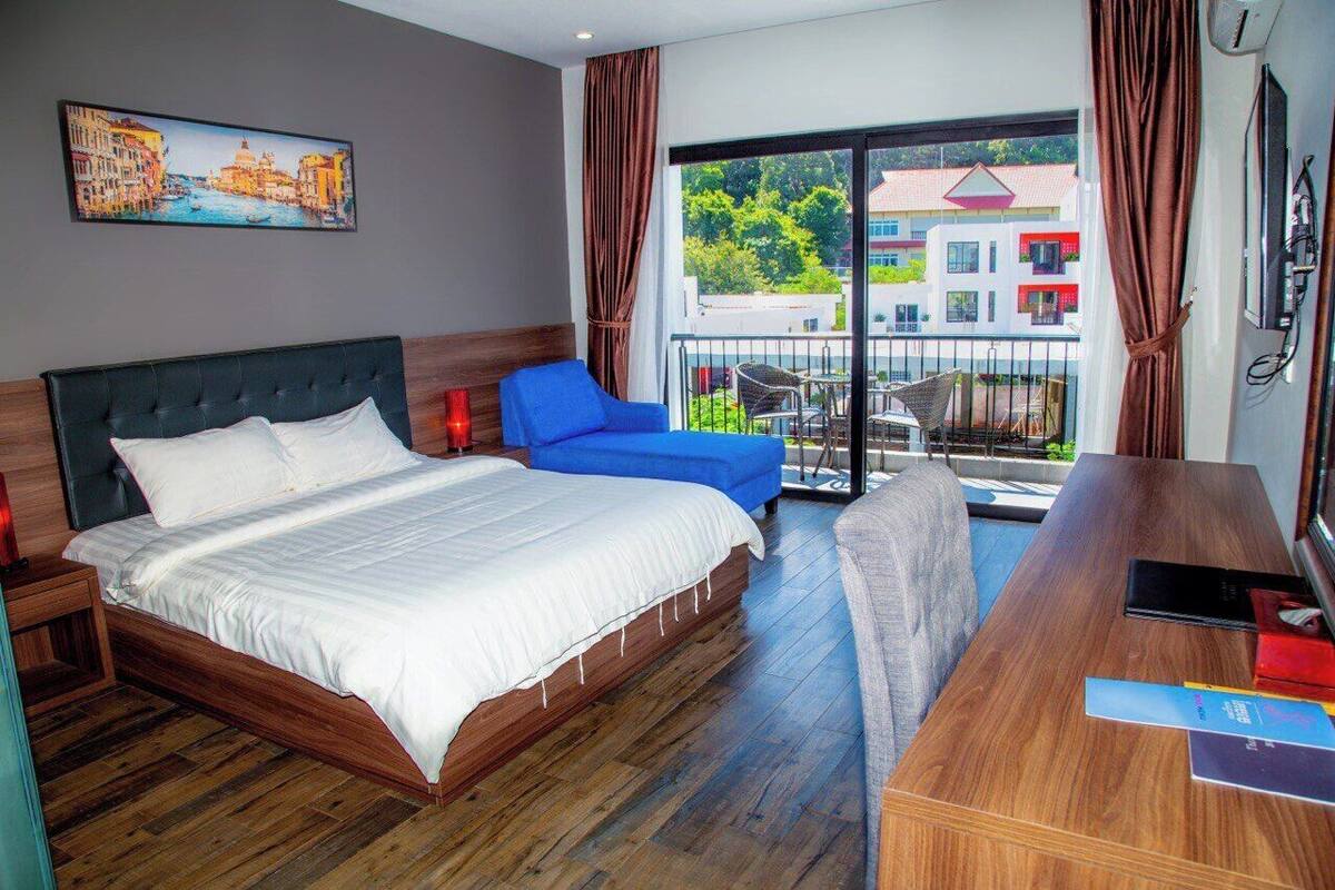 Habitación Deluxe doble, vistas a la montaña | 1 dormitorio, ropa de cama de alta calidad, minibar y caja fuerte