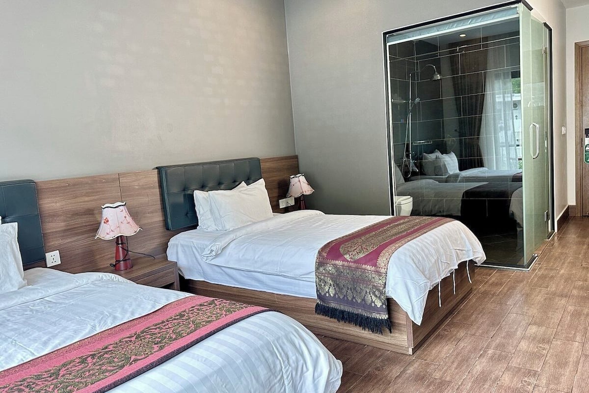 Habitación Deluxe con 2 camas individuales, vistas a la montaña | 1 dormitorio, ropa de cama de alta calidad, minibar y caja fuerte