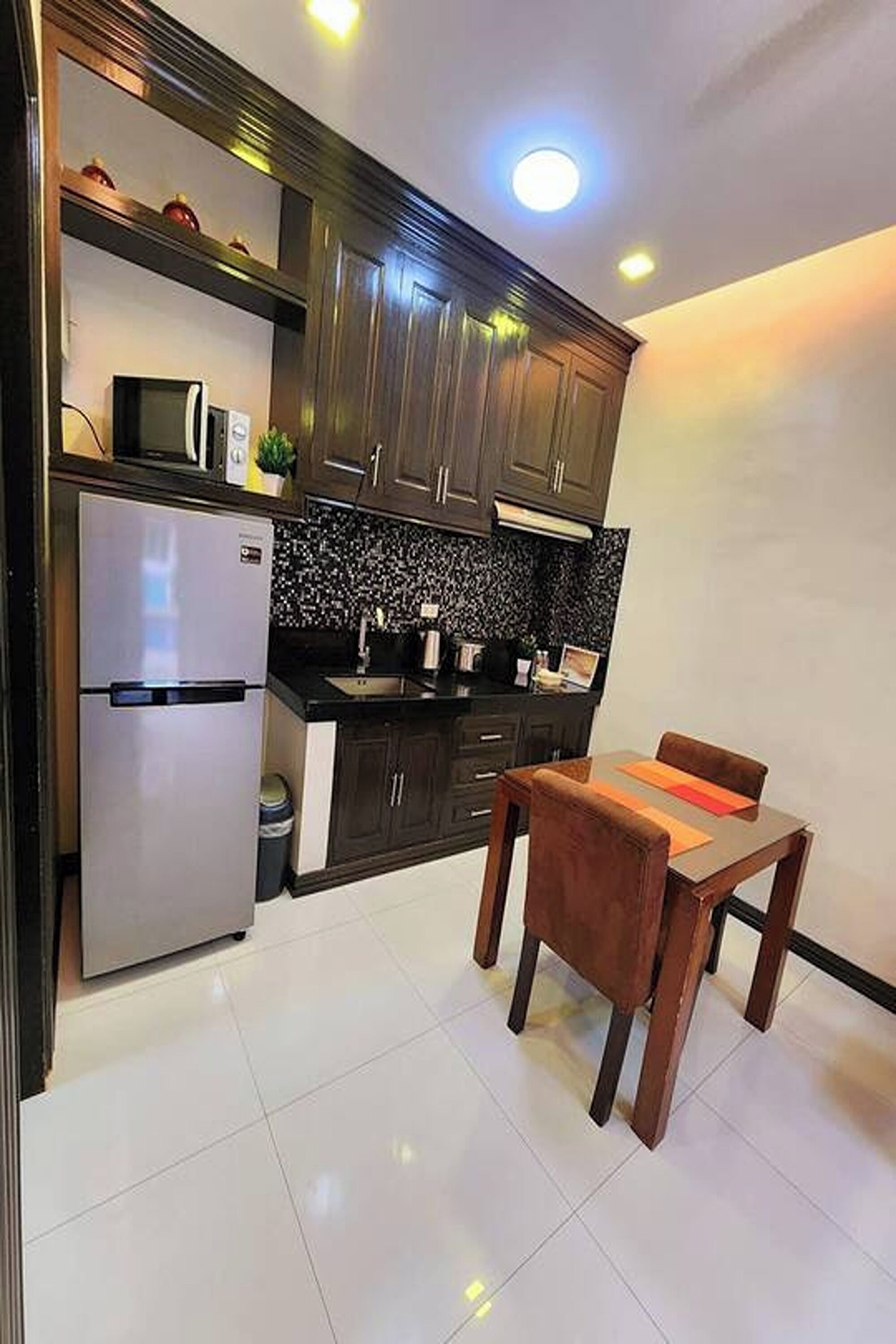 condo suite room | living area | 40-inch led tv with cable channels, tv