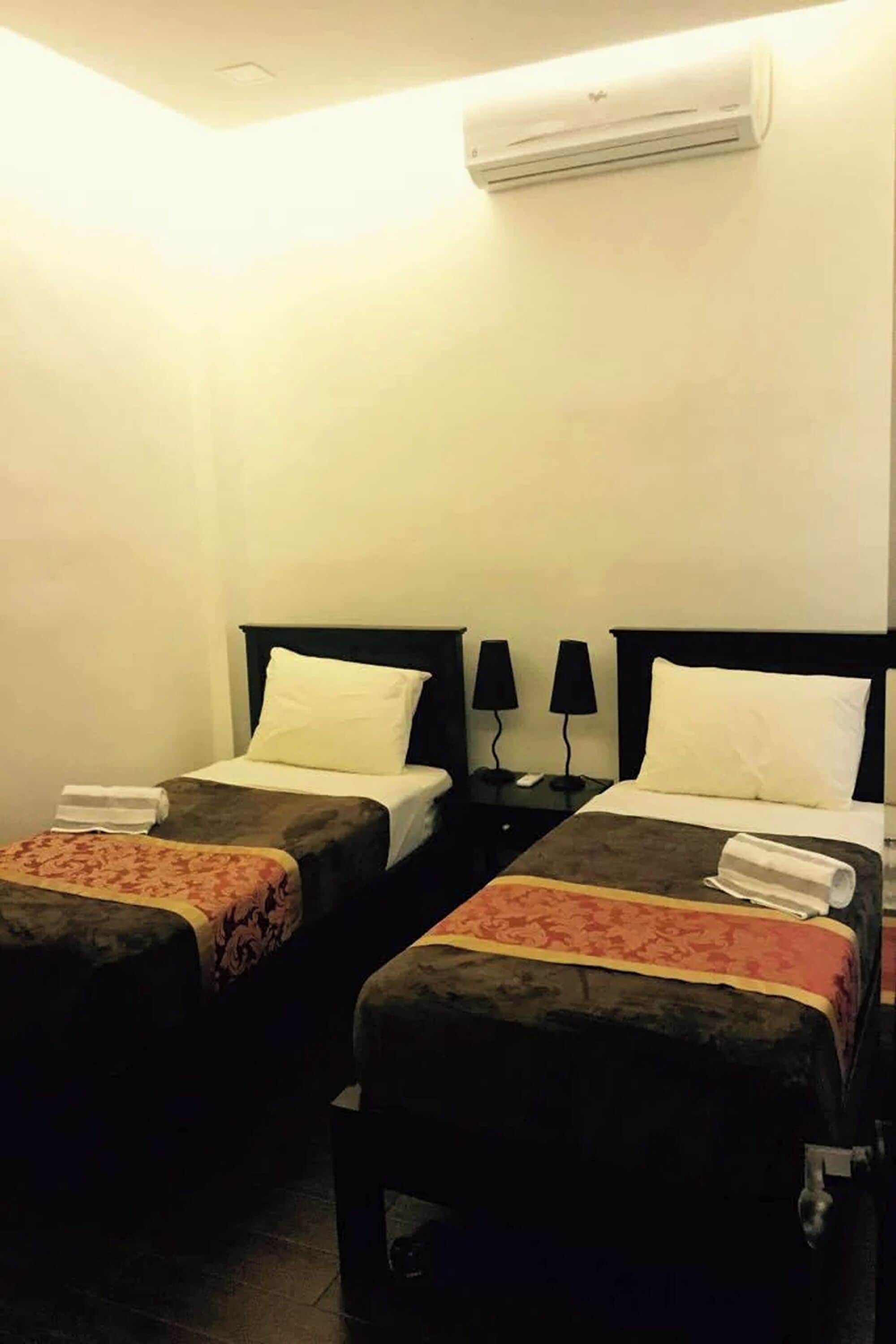 Condo Suites Twin | 1 bedroom, minibar, desk, free WiFi