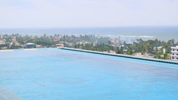 Outdoor pool, open 7 AM to 7 PM, sun loungers