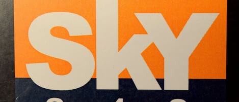 A sign with the word "SKY" and numbers "348".