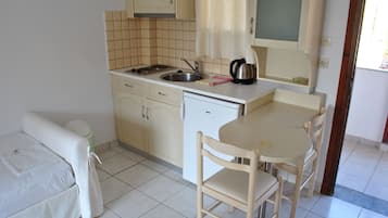 Comfort Apartment, 1 Bedroom, Poolside | 1 bedroom, iron/ironing board, free WiFi