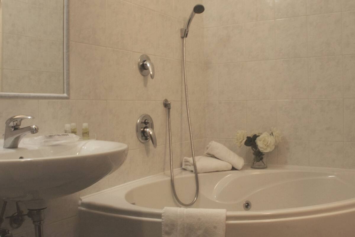 rainfall showerhead, free toiletries, hair dryer, bathrobes