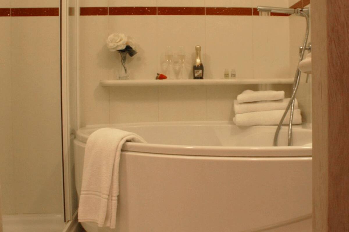 double room | bathroom | rainfall showerhead, free toiletries, hair dryer, bathrobes