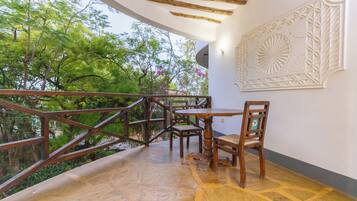 Standard Double Room, Garden View, Beachside | Balcony view