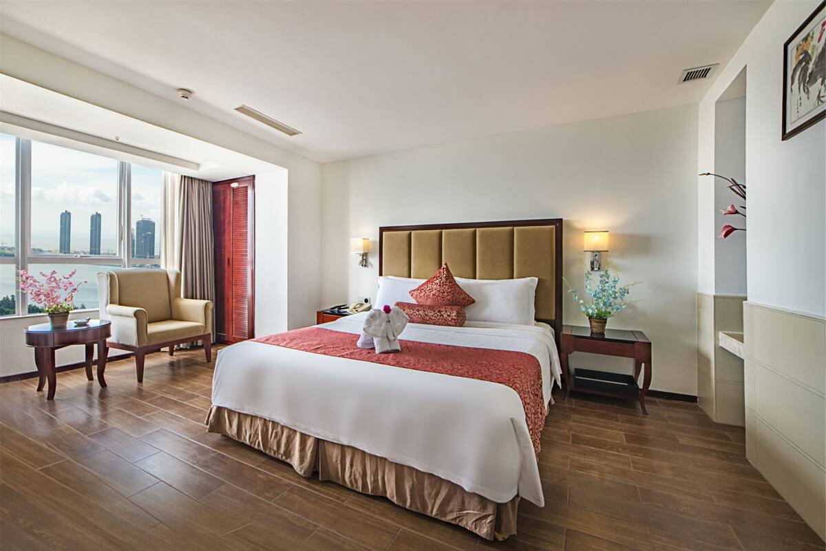 Habitación doble, vista al mar | Ropa de cama de alta calidad y minibar