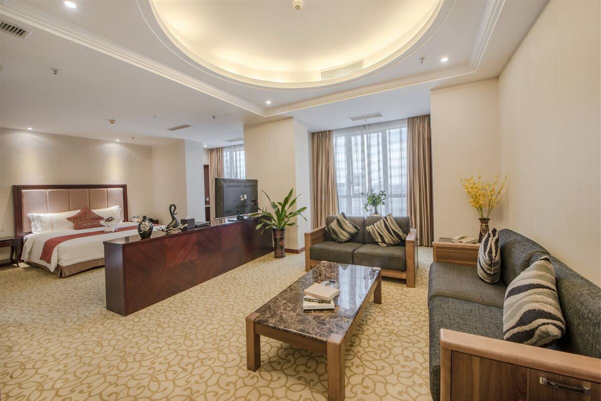 Suite ejecutiva, 1 habitación | Ropa de cama de alta calidad y minibar