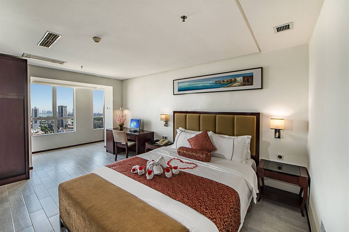 Suite Deluxe, 1 habitación, vista al mar | Ropa de cama de alta calidad y minibar