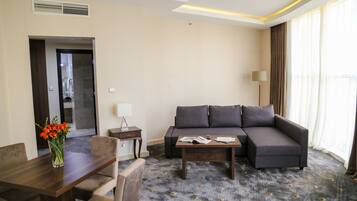 Executive Suite | Living room | 48-inch TV with satellite channels
