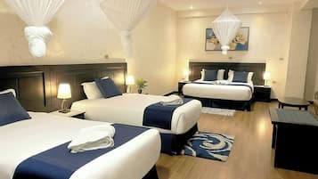 Family Triple Room, Mobility Accessible, City View | Memory-foam beds, free minibar, in-room safe, desk
