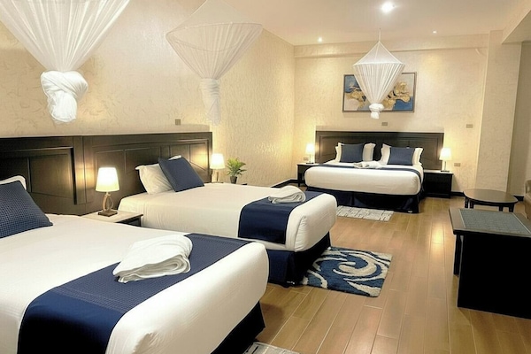 Family Triple Room, Mobility Accessible, City View | Premium bedding, memory foam beds, free minibar, in-room safe