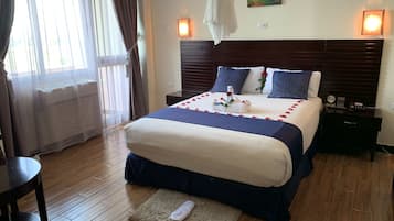 Economy eenpersoonskamer | Bedden met traagschuimmatras, een gratis minibar, een kluis op de kamer