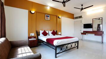 Deluxe Room, 1 Bedroom (Airconditioned) | 1 bedroom, desk, free WiFi, bed sheets