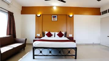 Deluxe Room, 1 Bedroom (Airconditioned) | 1 bedroom, desk, free WiFi, bed sheets
