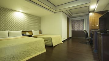 Family Triple Room | Desk, blackout drapes, iron/ironing board, free WiFi