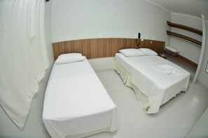 Habitación individual de lujo | Minibar, escritorio, cortinas opacas y tabla de planchar con plancha