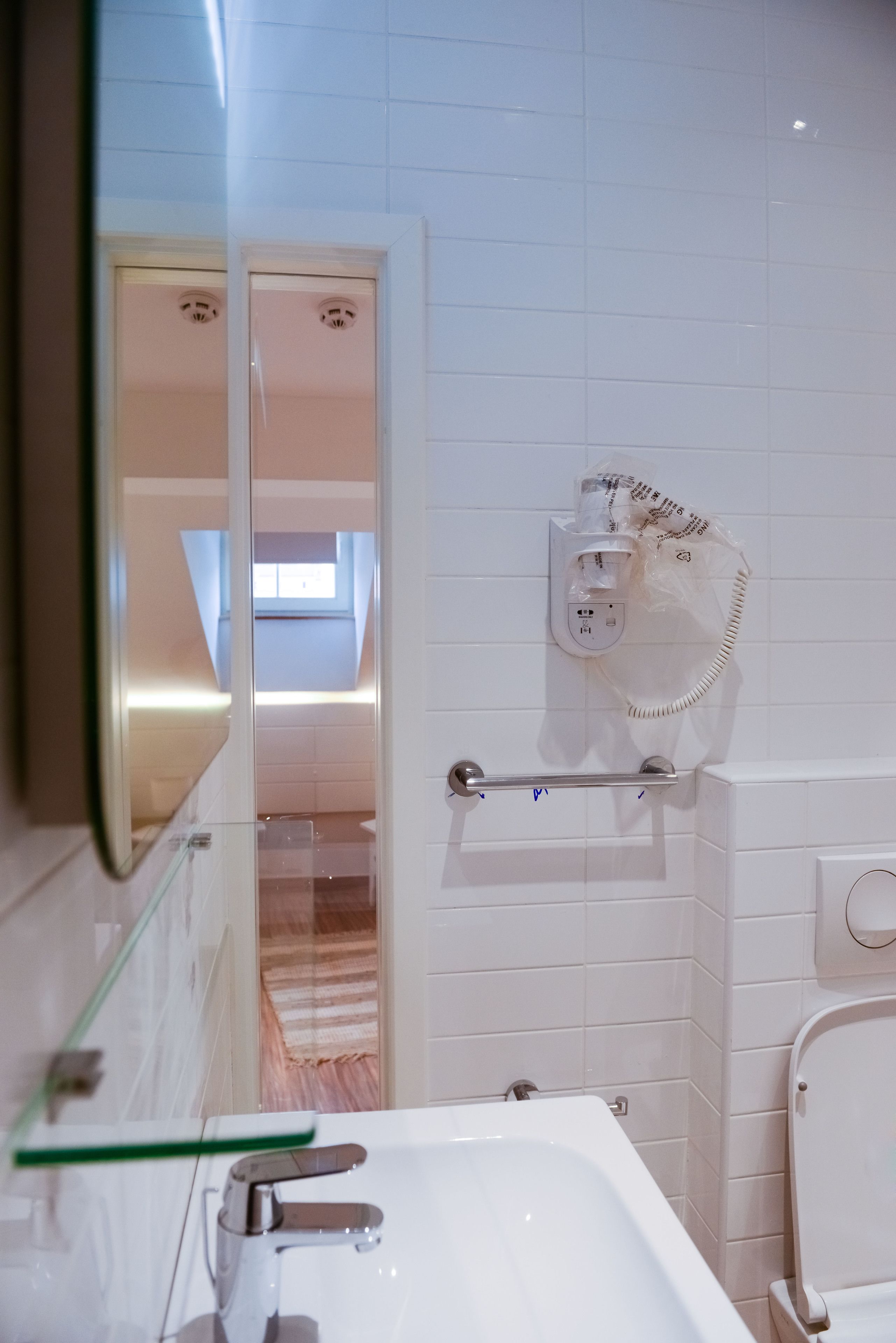 superior twin room | bathroom | shower, free toiletries, hair dryer, slippers