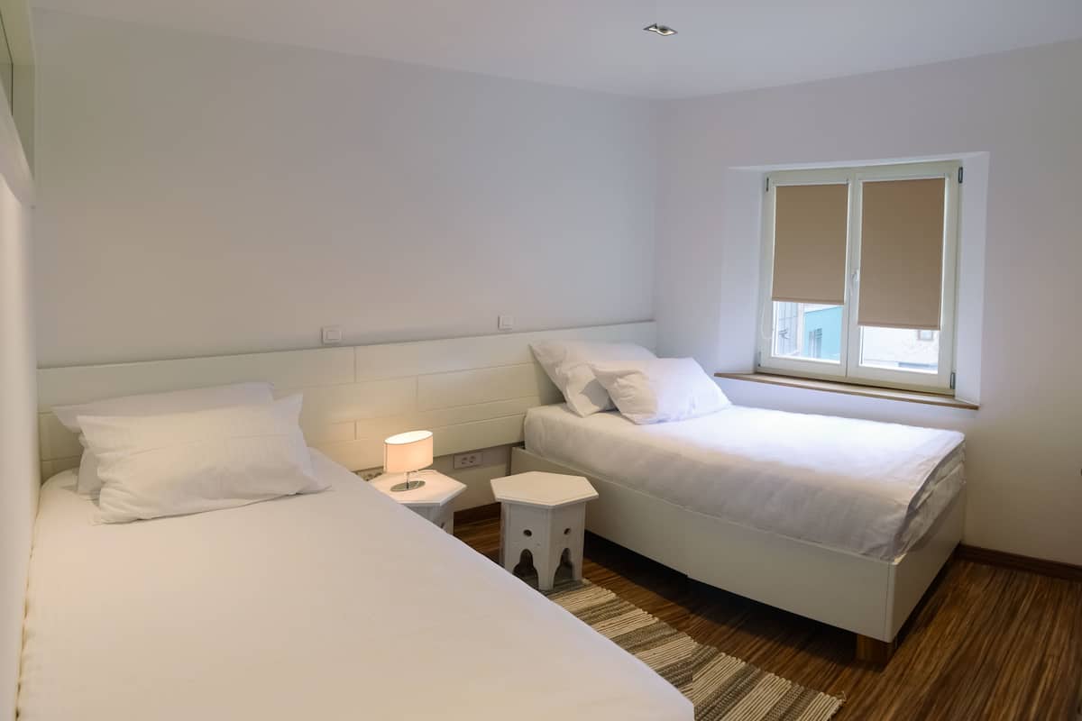 superior twin room | in-room safe, desk, iron/ironing board, free cots/infant beds