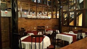 Dinner served, French cuisine, garden views