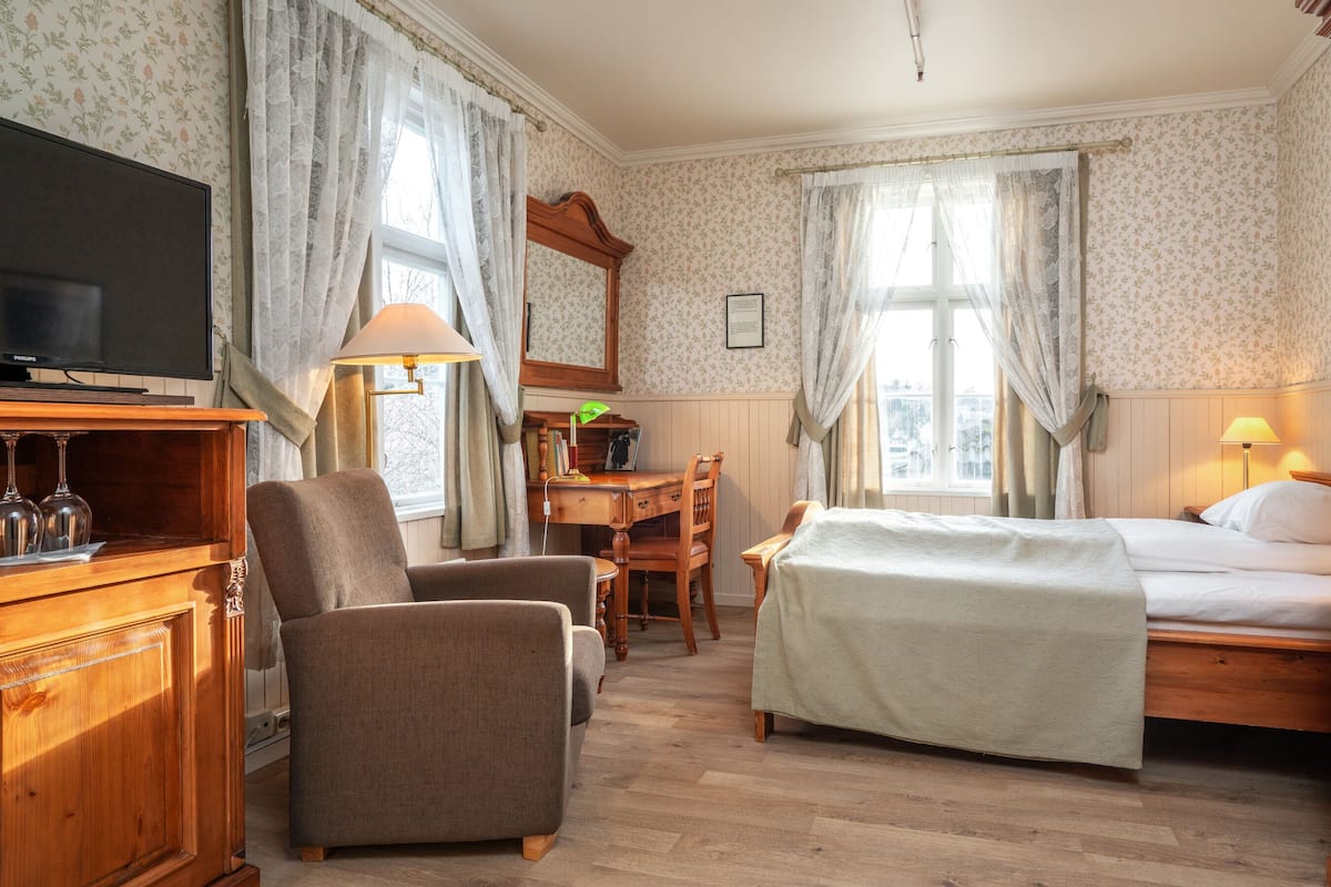 Donsdekens, pillowtop-bedden, een minibar, een kluis op de kamer