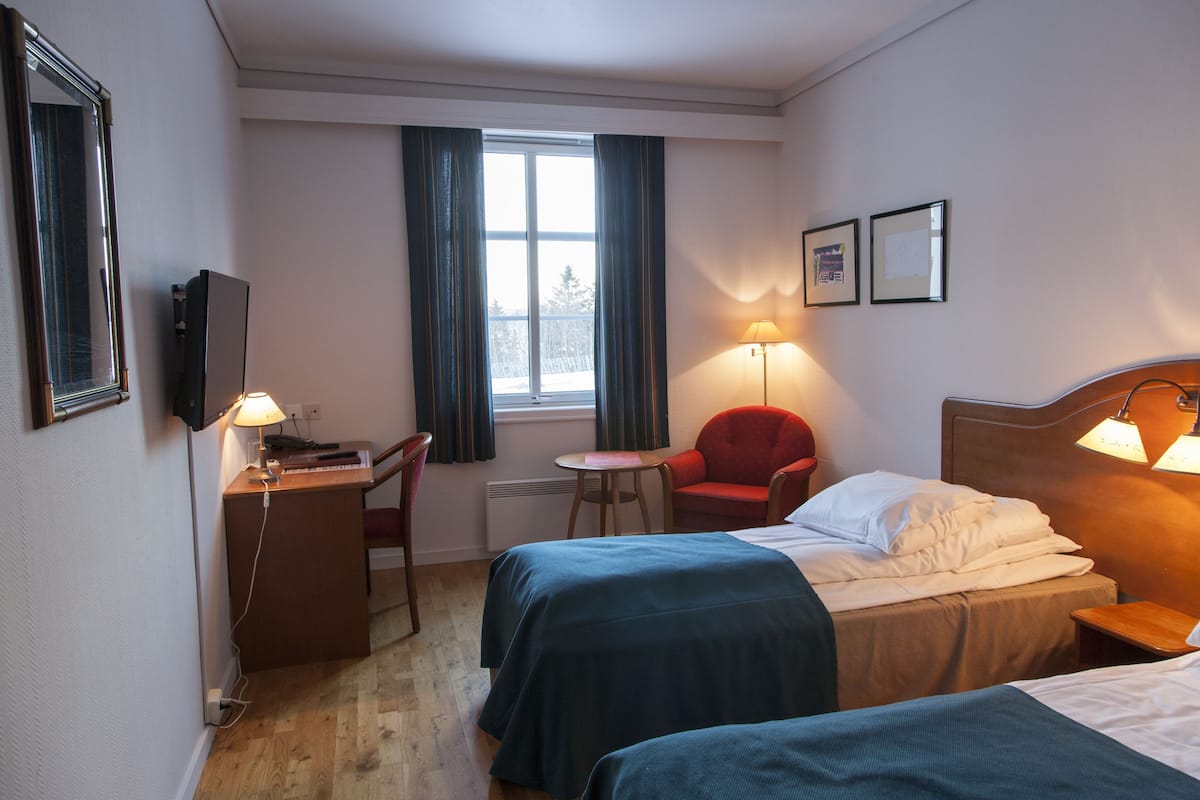 Down duvets, pillow-top beds, minibar, in-room safe