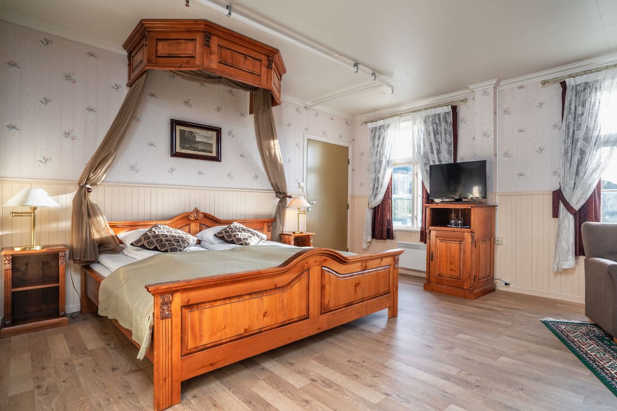 Donsdekens, pillowtop-bedden, een minibar, een kluis op de kamer