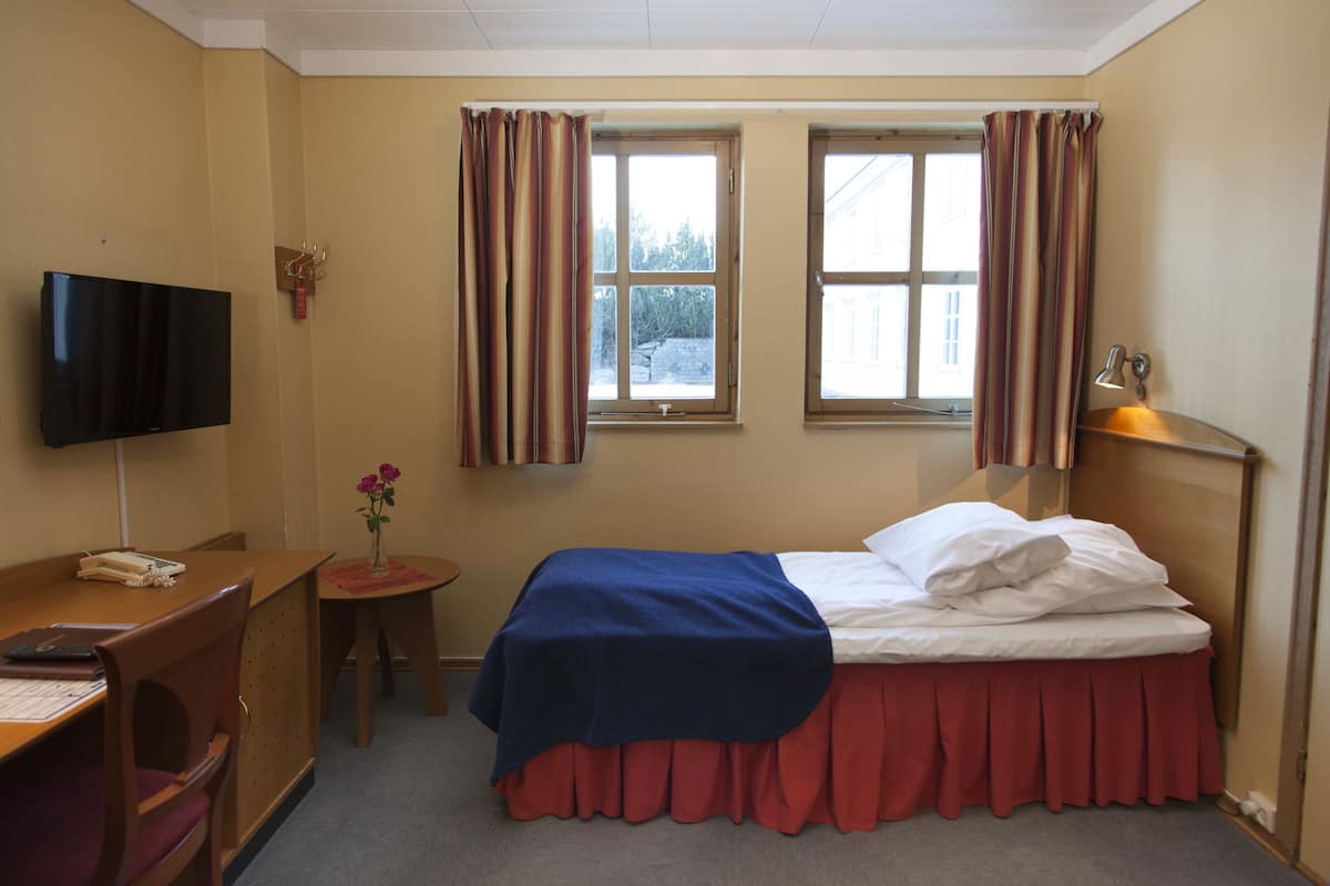 Down duvets, pillow-top beds, minibar, in-room safe