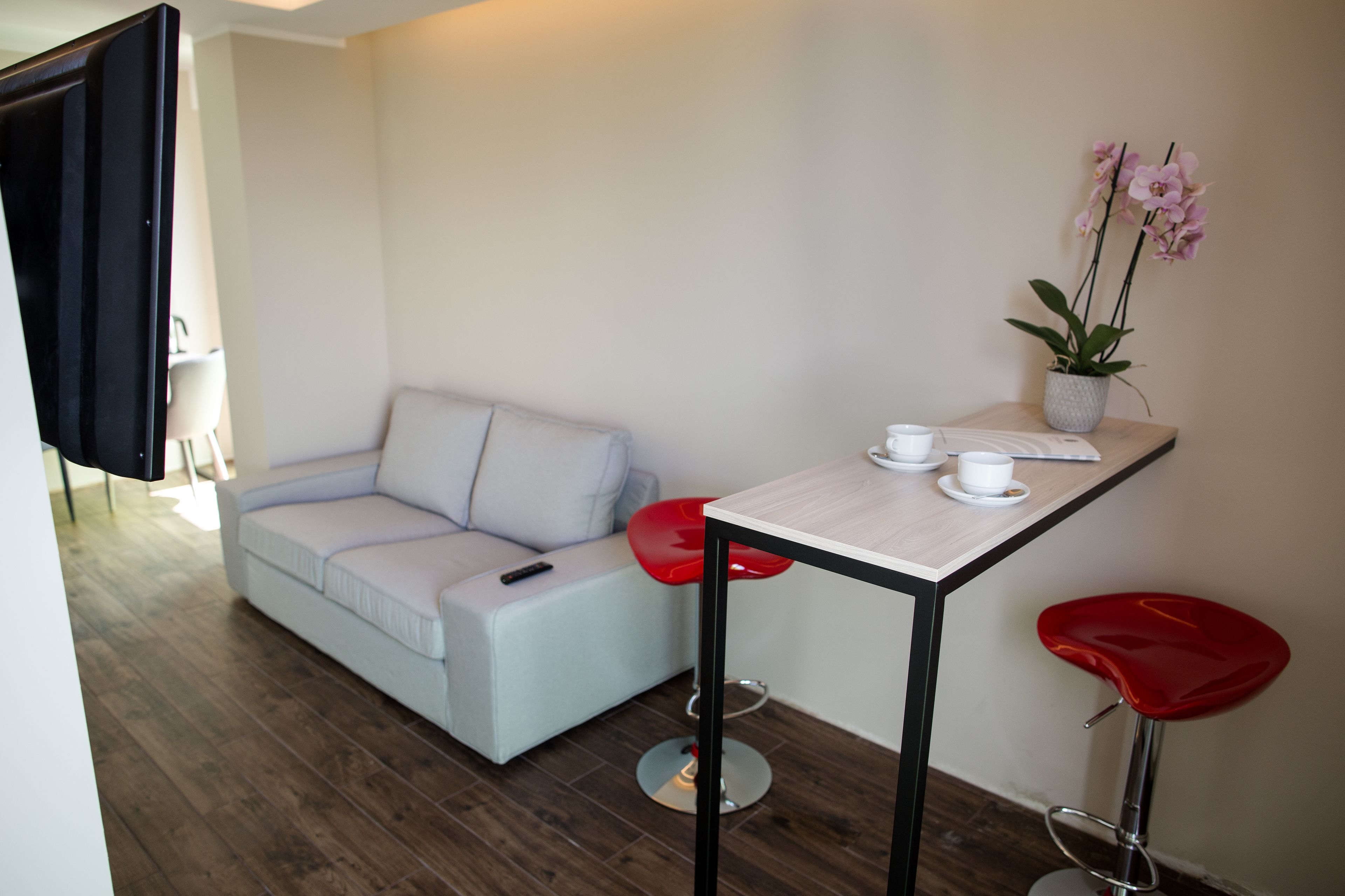 business apartment, 1 bedroom | living room | flat-screen tv