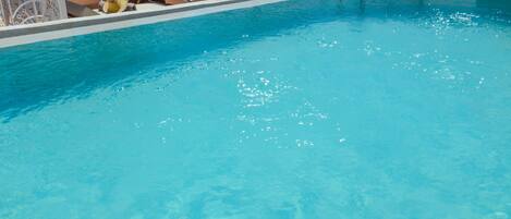 Outdoor pool, pool umbrellas, sun loungers