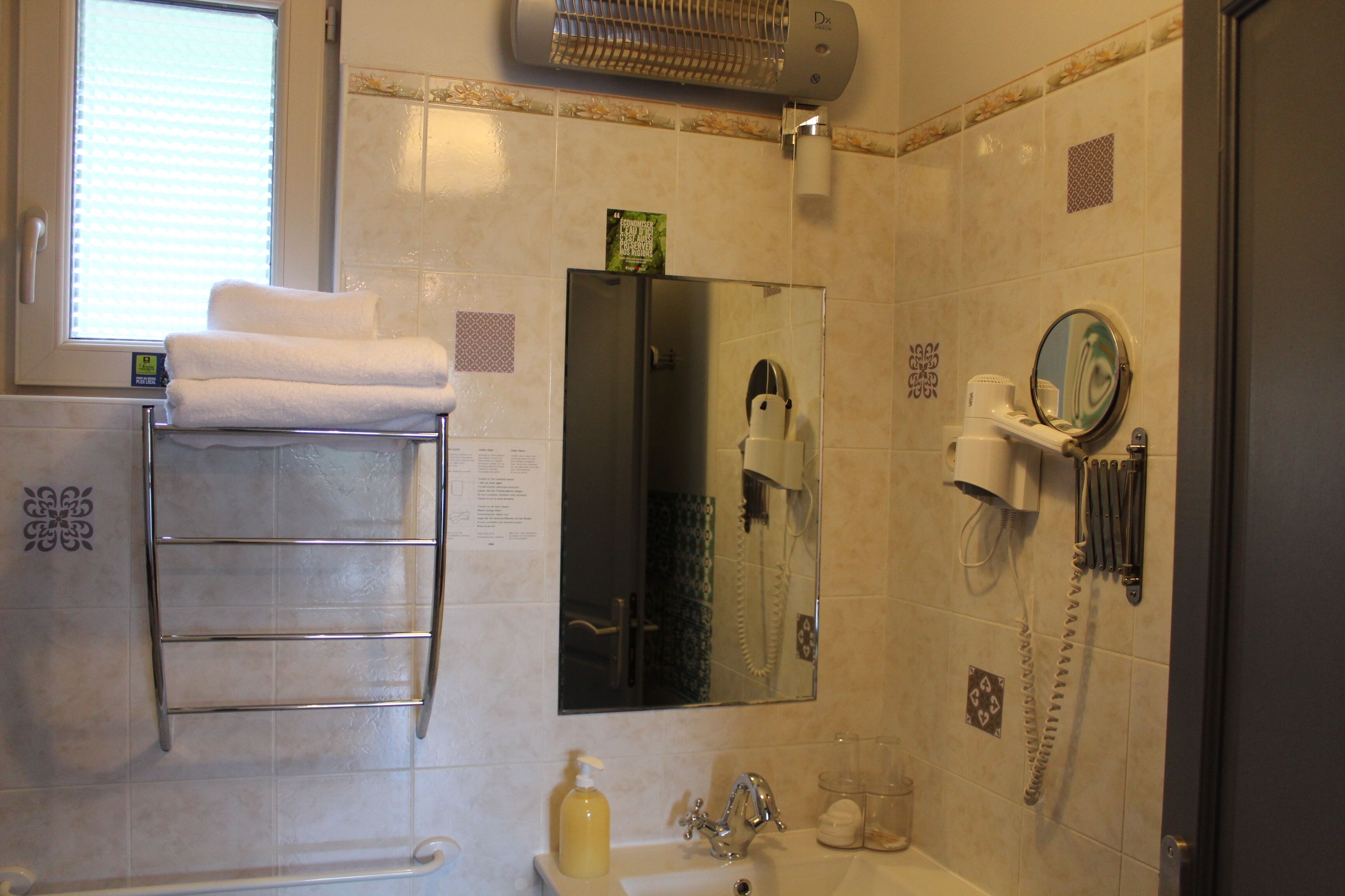 shower, free toiletries, hair dryer, towels