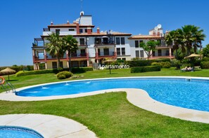 8 outdoor pools, an infinity pool, open open 24 hours, pool umbrellas