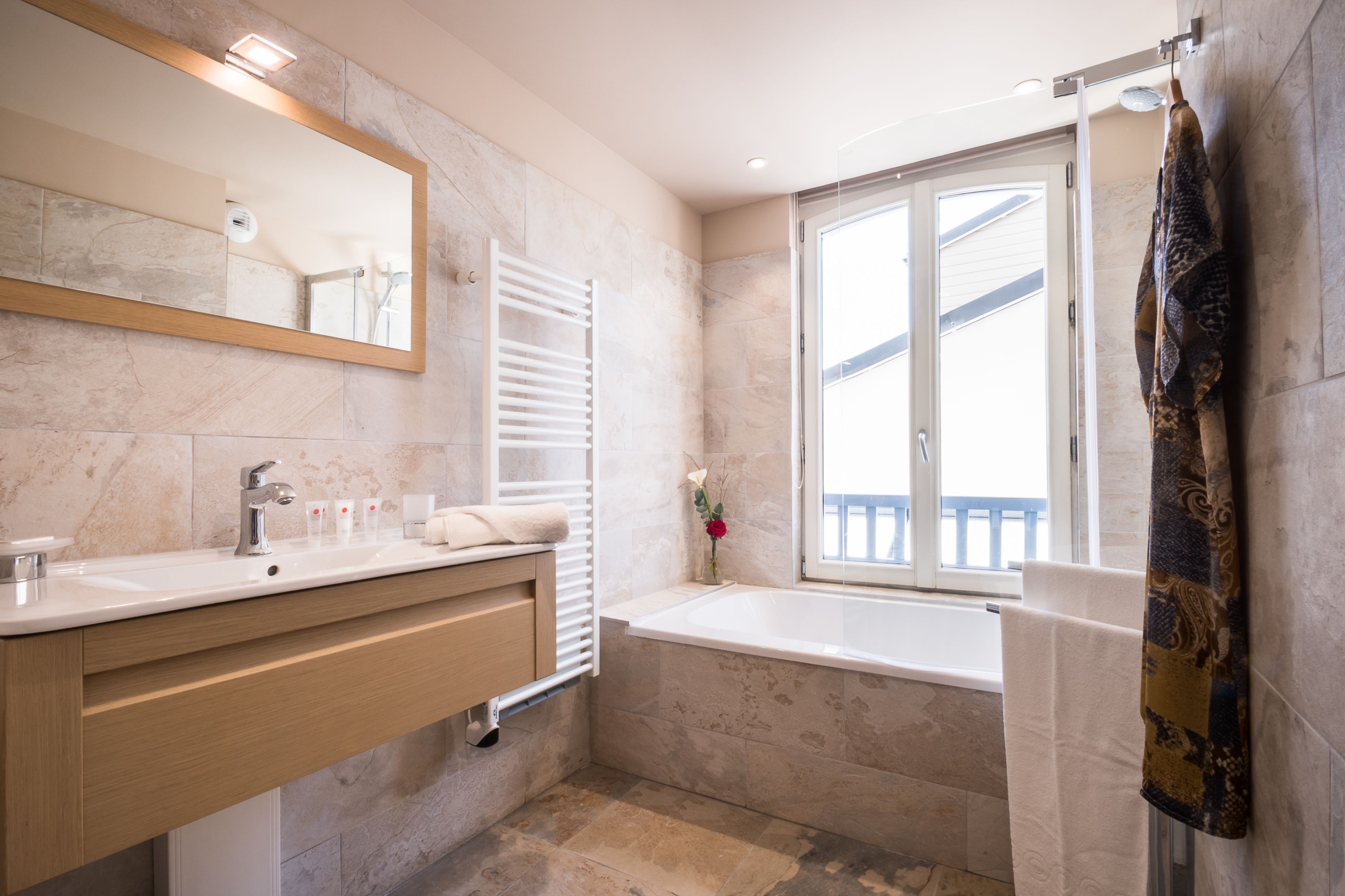 bathtub, free toiletries, bathrobes, slippers