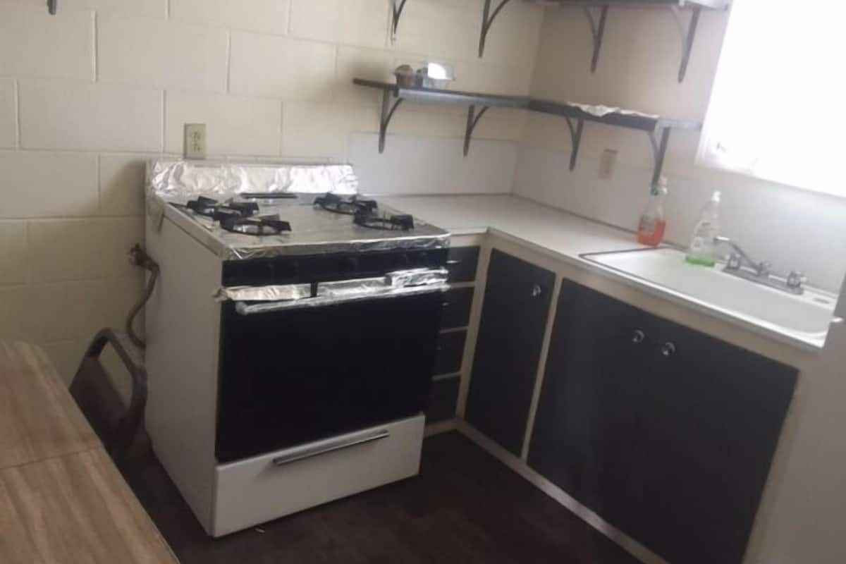 Room, Multiple Beds, Kitchenette | Private kitchenette | Fridge, microwave
