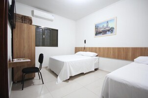 Minibar, desk, WiFi (free), bed sheets