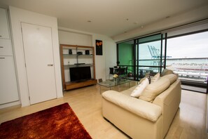 Apartment, 2 Bedrooms | Living area | Flat-screen TV