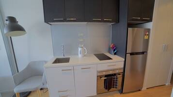 Downtown Apartment with Amazing Views | Private kitchen | Fridge, microwave, oven, stovetop