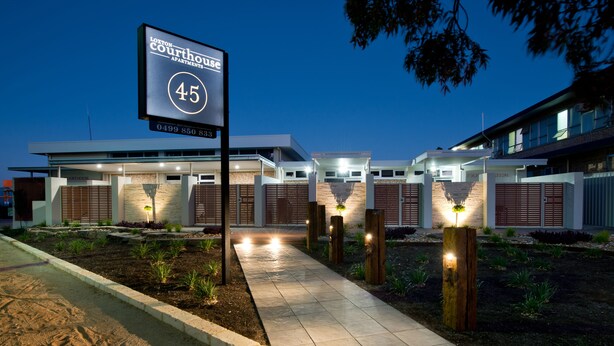 A modern building with a sign indicating it is the 45th building in a series, likely part of a larger complex. - Loxton Courthouse Apartments (Loxton)