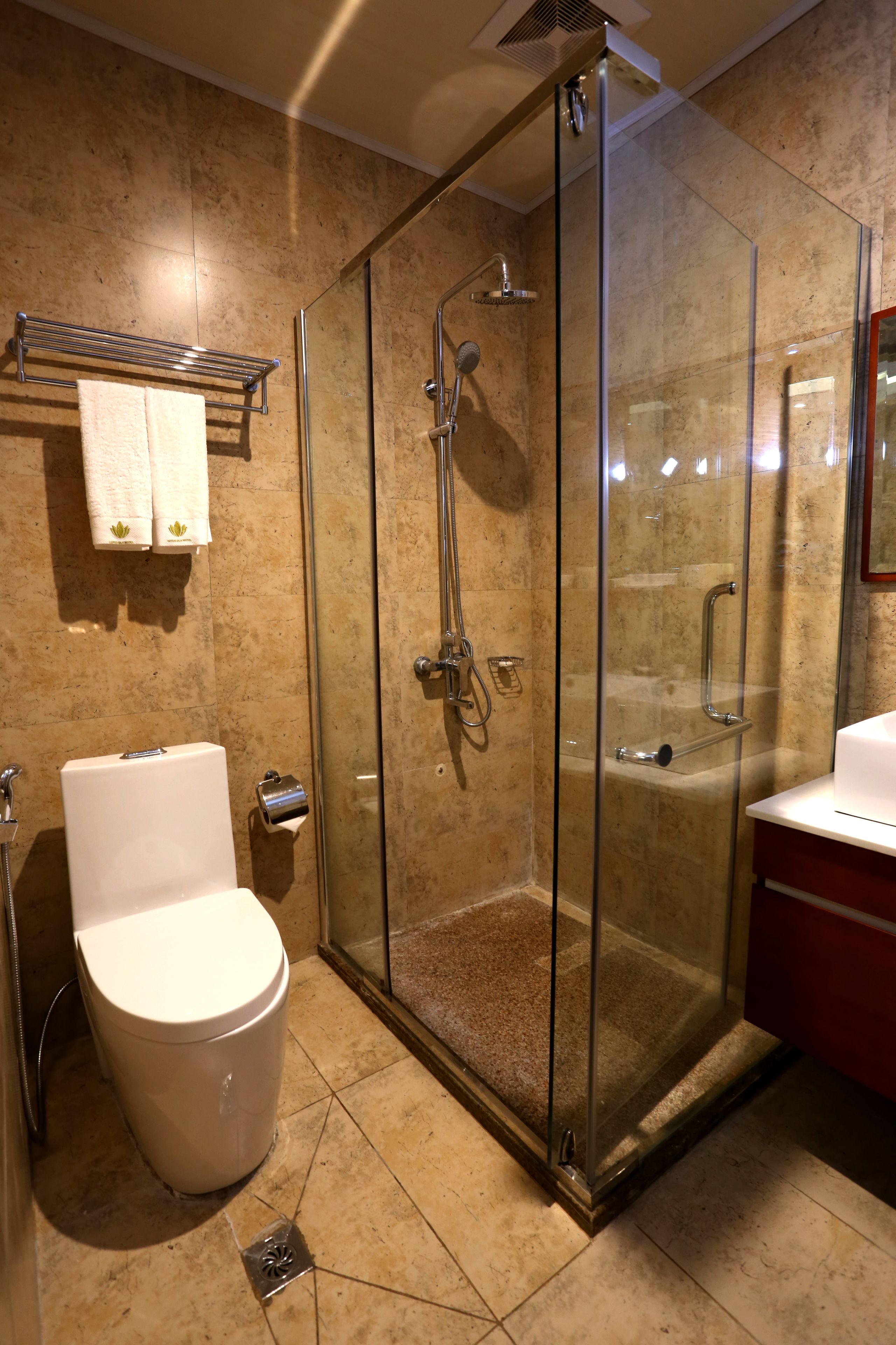 shower, free toiletries, hair dryer, slippers