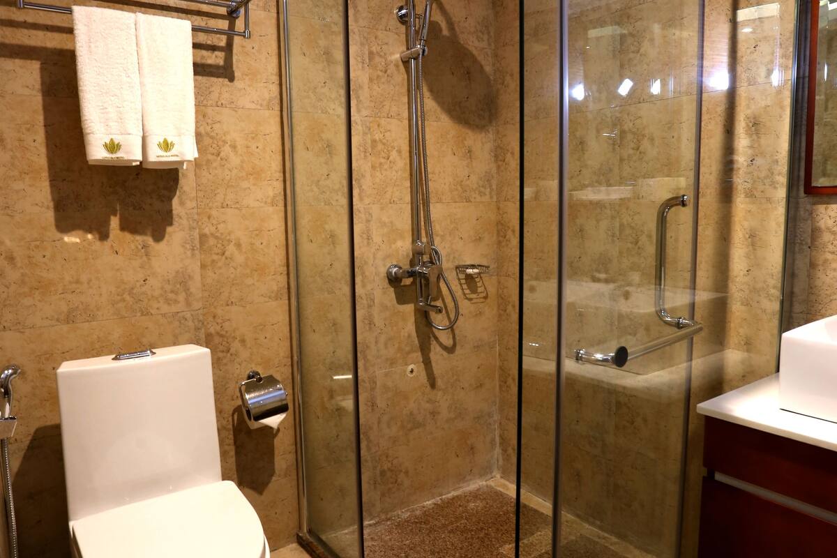 shower, free toiletries, hair dryer, slippers