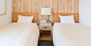 Chambre avec lits jumeaux, non-fumeurs | Bureau, espace de travail pour ordinateur portable, Wi-Fi gratuit