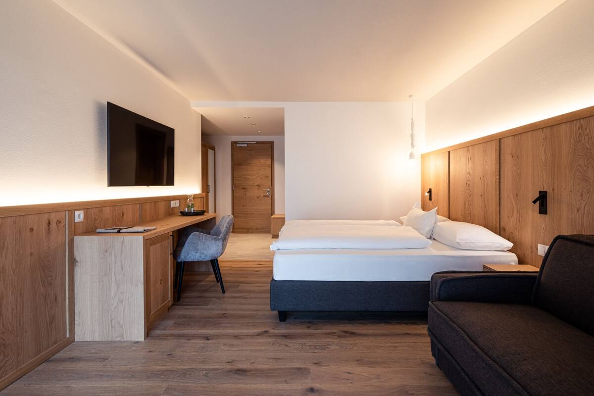 Luxe beddengoed, donsdekens, een minibar, een kluis op de kamer
