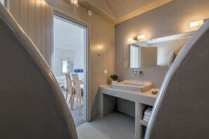 Shower, free toiletries, hair dryer, slippers