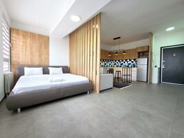 Superior Studio Suite, City View | Individually decorated, individually furnished, iron/ironing board