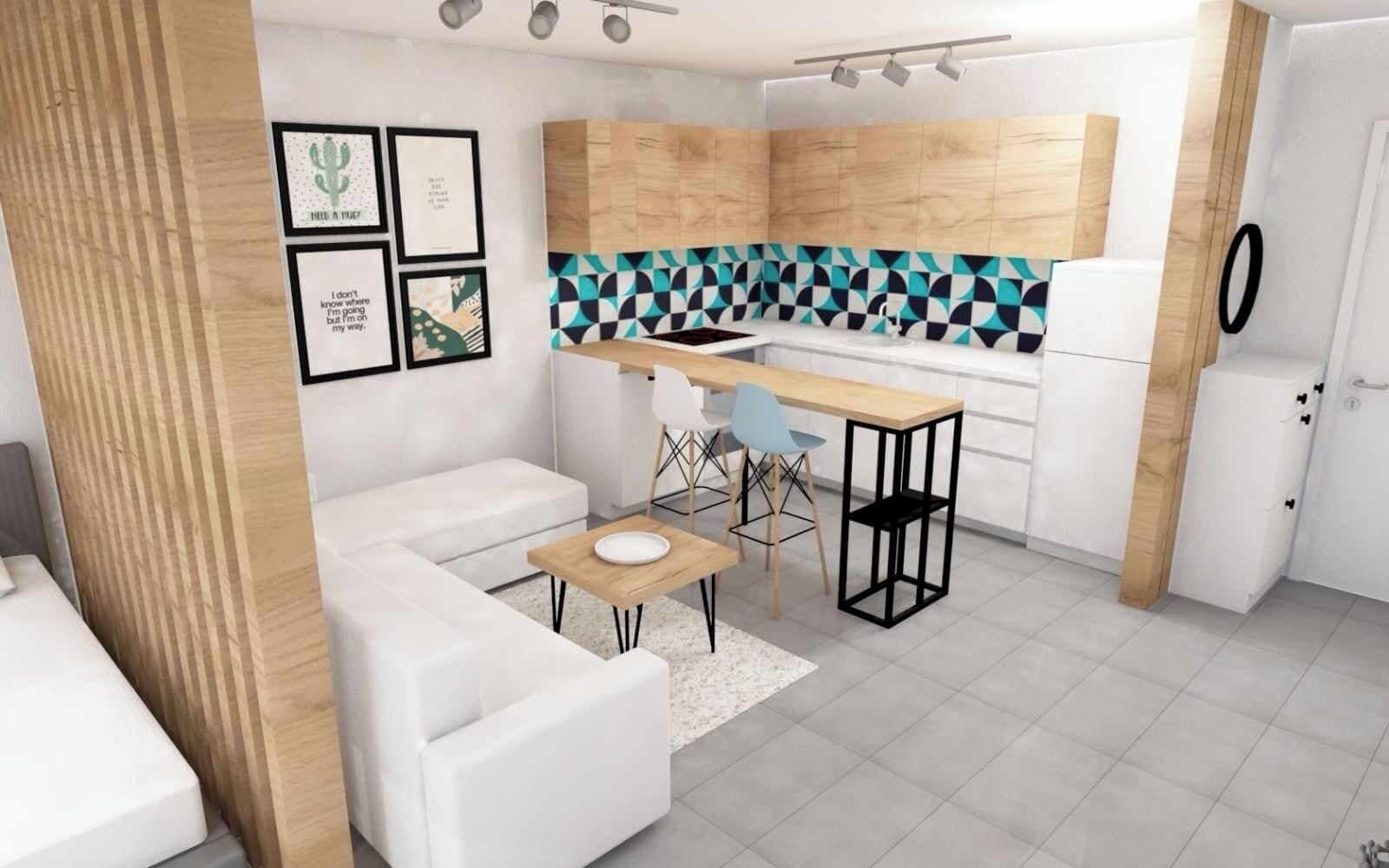 Een moderne keuken met een houten aanrechtblad, witte kasten en een geometrisch patroon op de achterwand. Er is een zithoek met een witte bank en een kleine tafel.
