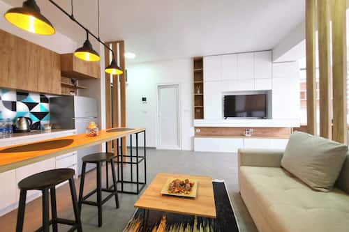 Superior Studio Suite, City View | Individually decorated, individually furnished, iron/ironing board
