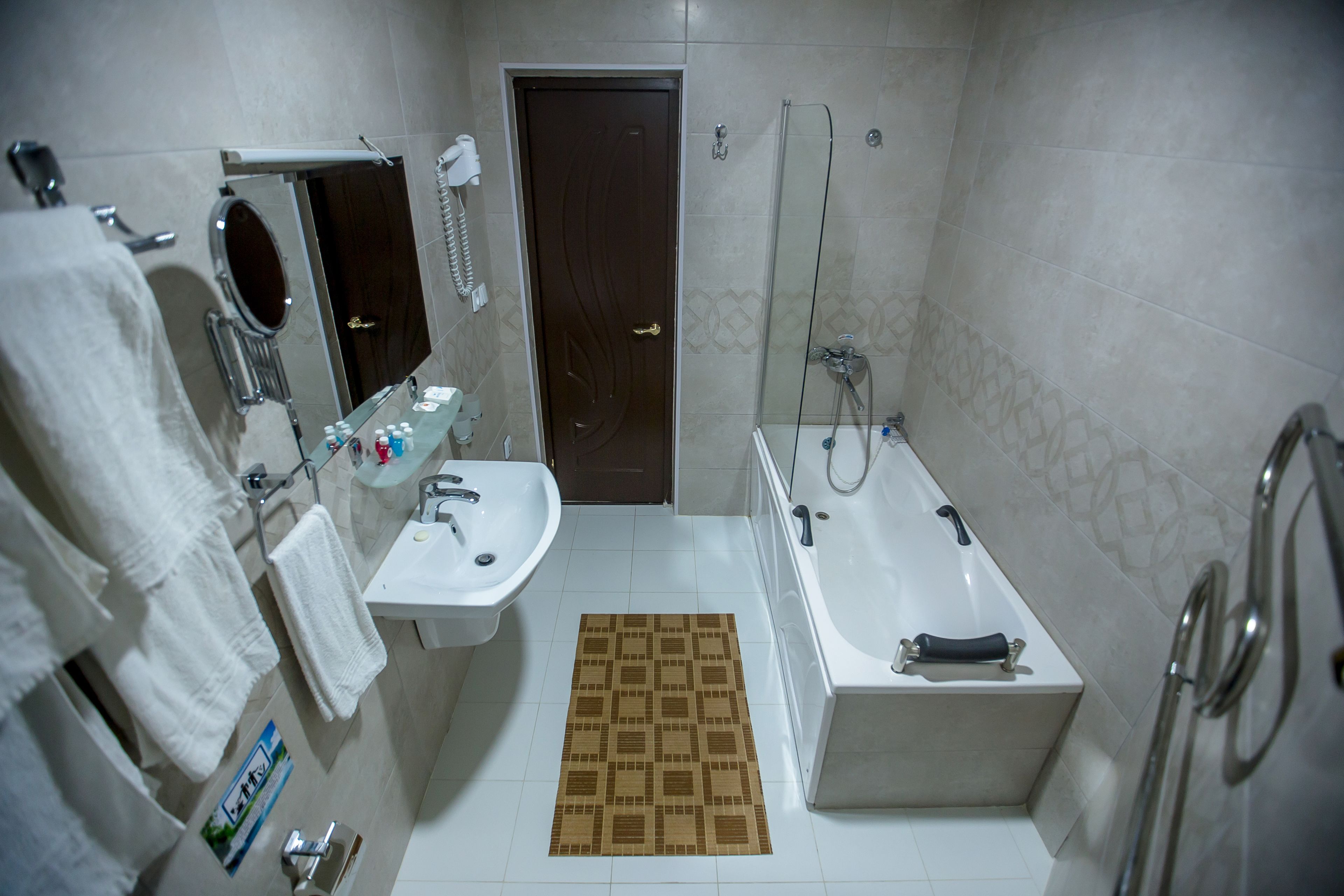 deluxe double room | bathroom | free toiletries, hair dryer, slippers, towels