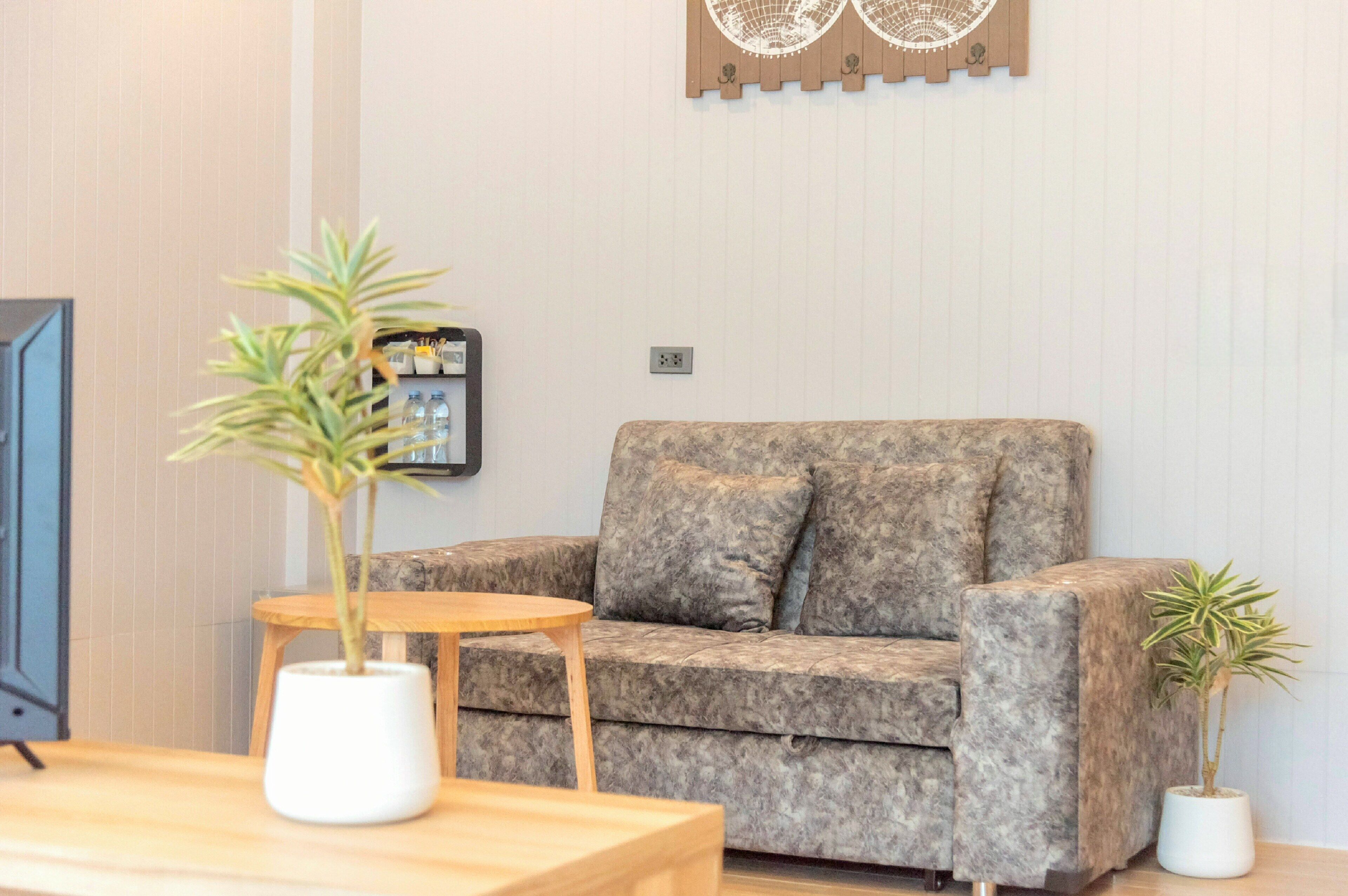 grand deluxe room | living area | flat-screen tv, dvd player